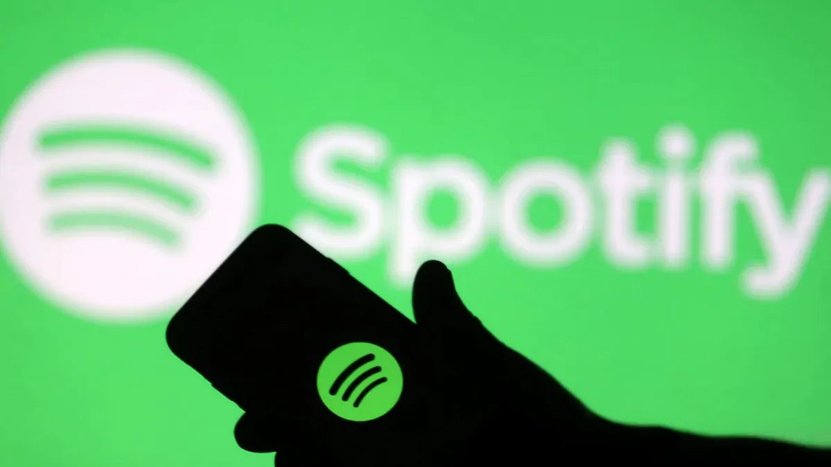 Kif tissejvja l-mużika Spotify fuq karta SD?